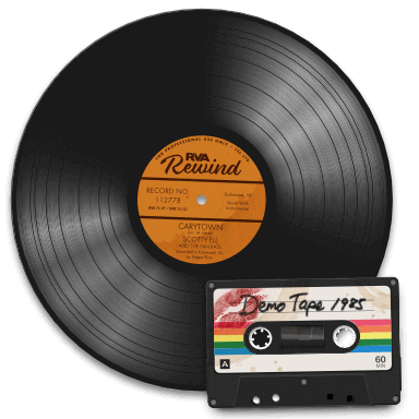 Audio cassette tape and vinyl record awaiting conversion to digital MP3 files